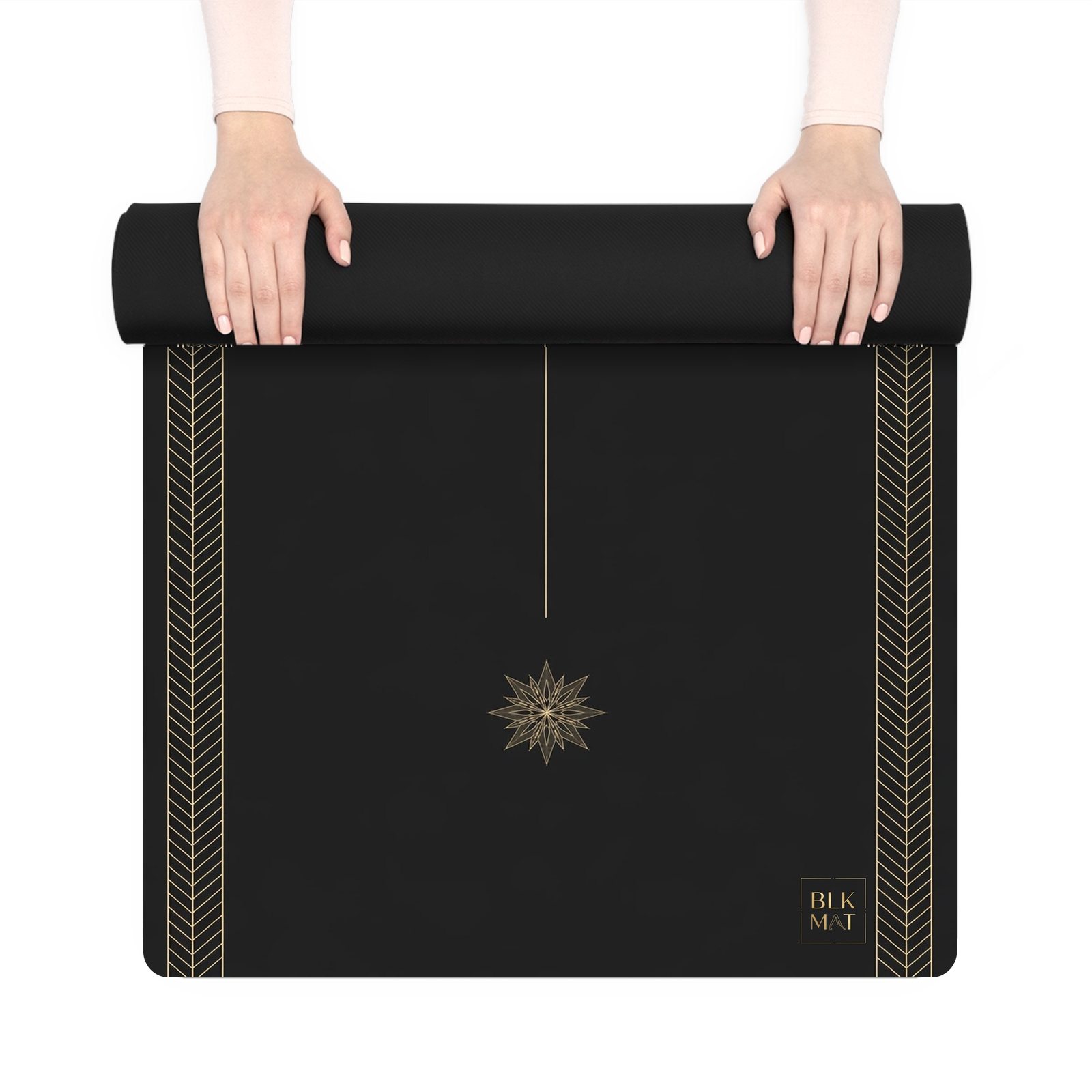 BLKMAT Adobe Sun yoga mat, held up and partly rolled