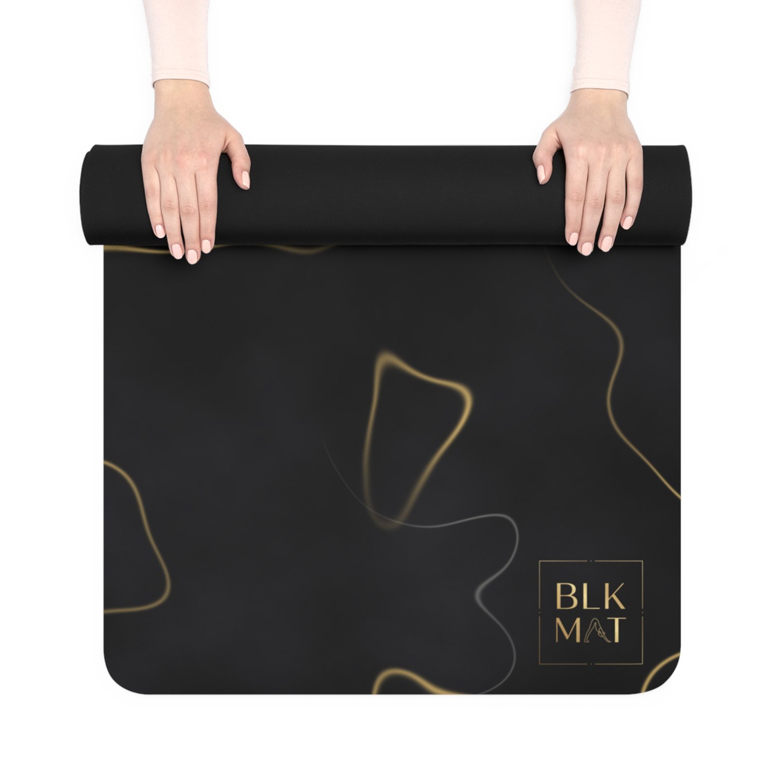 BLKMAT Black Marble, Gold Vein yoga mat, held up and partly rolled