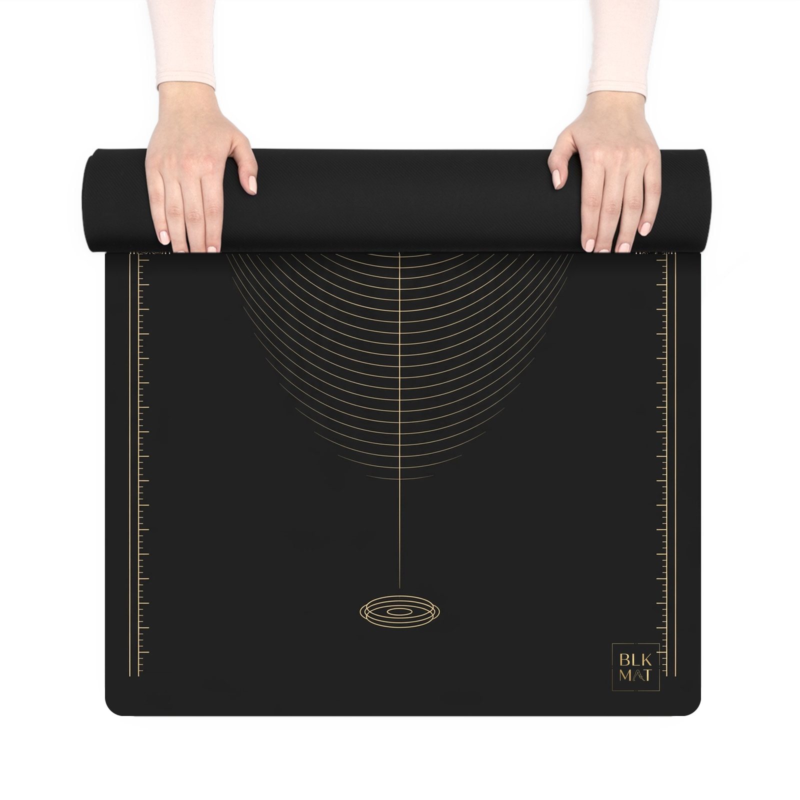 BLKMAT Breath Horizon yoga mat, held up and partly rolled