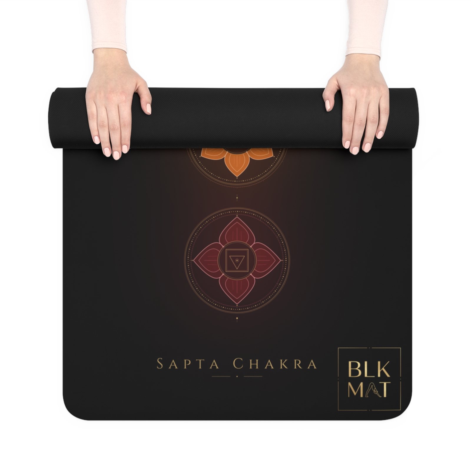 BLKMAT Full Chakra yoga mat, held up and partly rolled