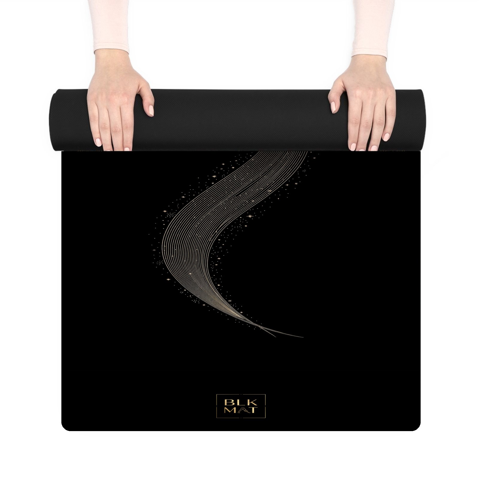 BLKMAT Comet Tail Arc yoga mat, held up and partly rolled