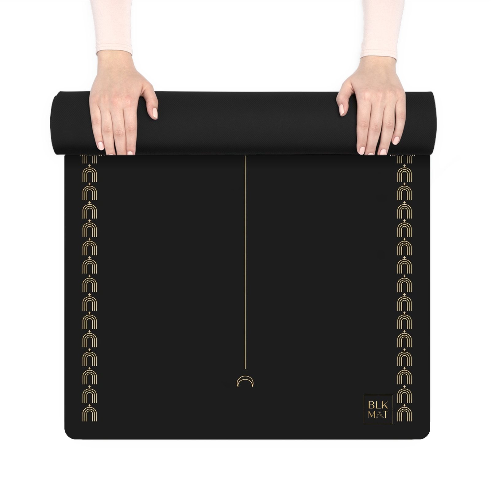 BLKMAT Crescent Silence yoga mat, held up and partly rolled