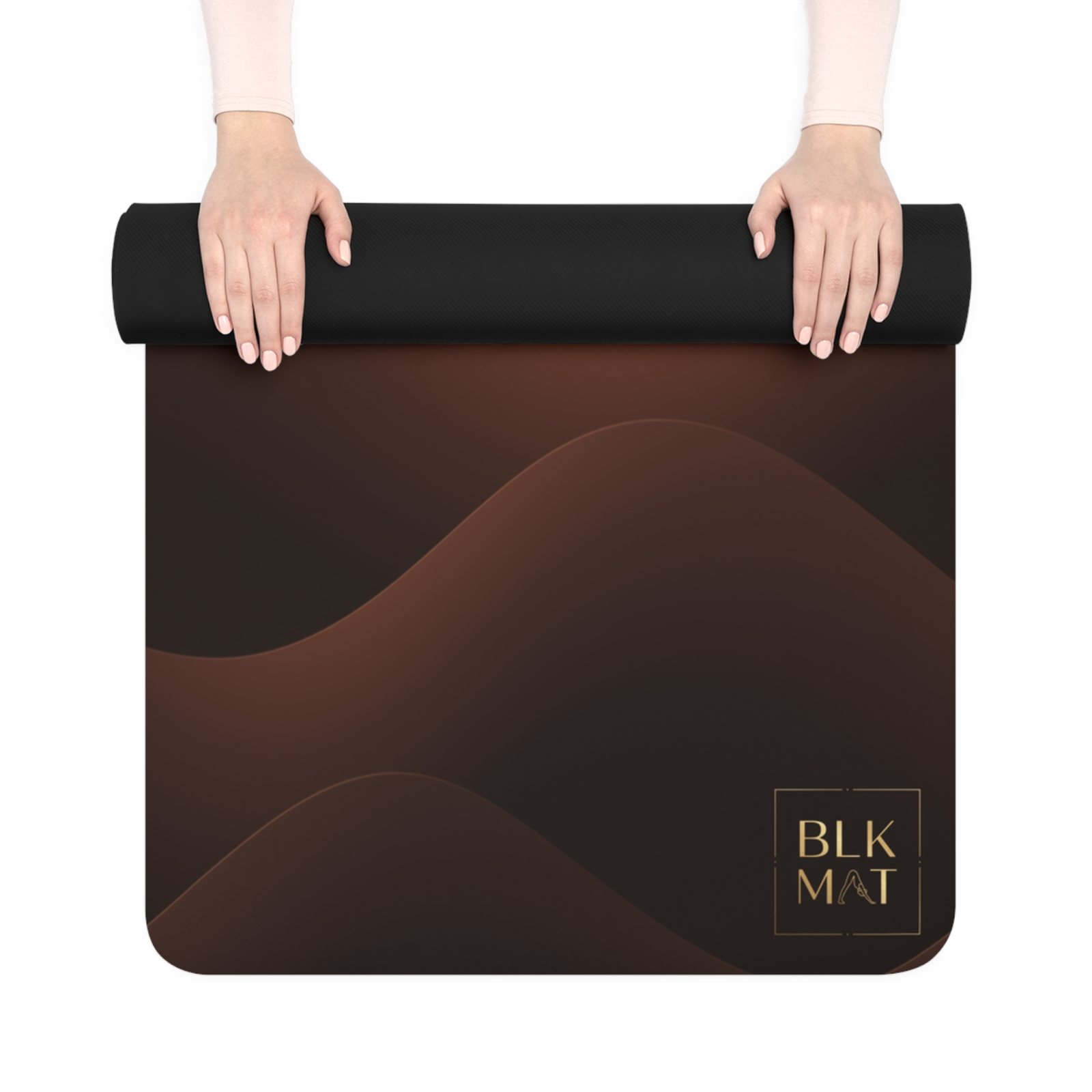 BLKMAT Desert Dune Dusk yoga mat, held up and partly rolled
