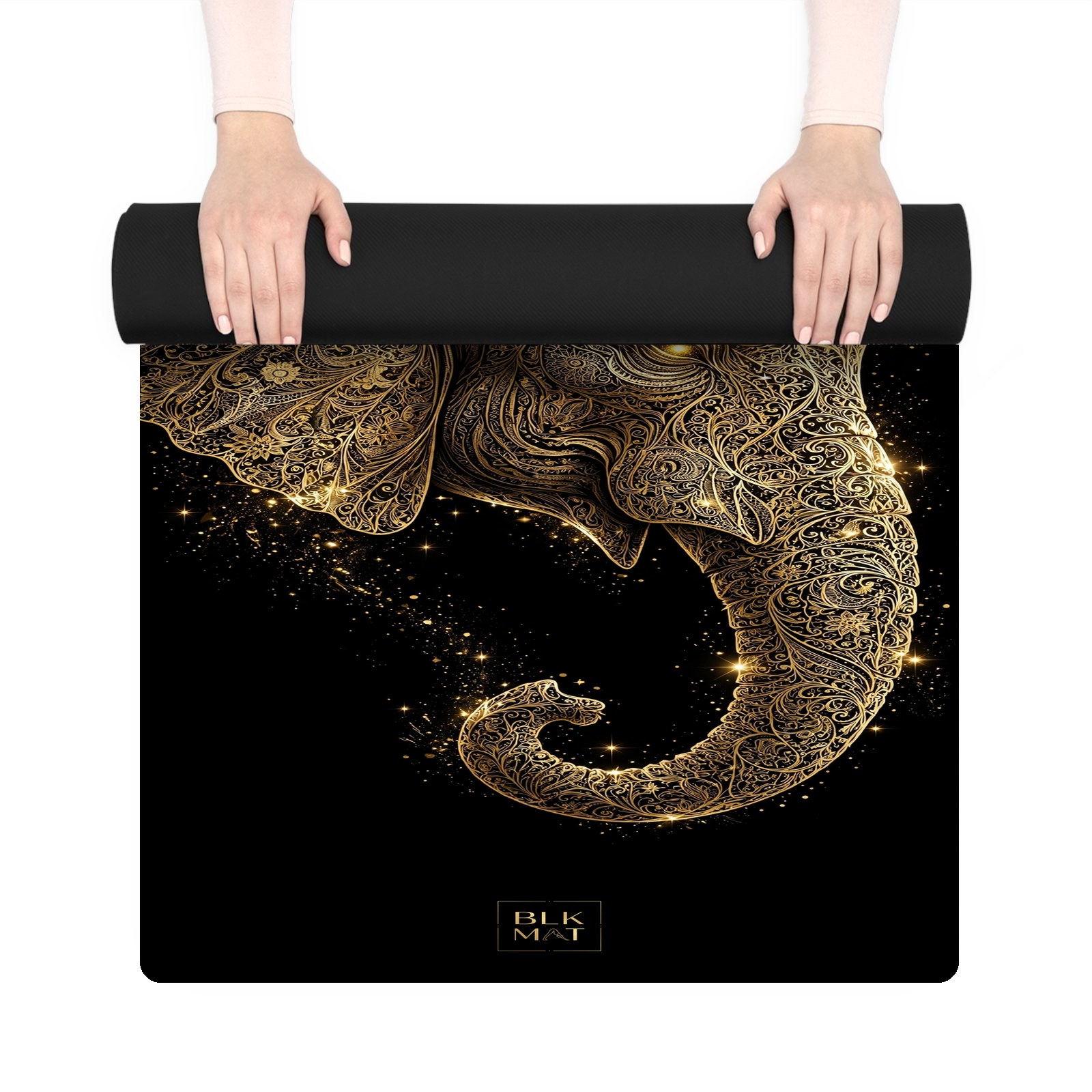 BLKMAT Elephant Filigree yoga mat, held up and partly rolled