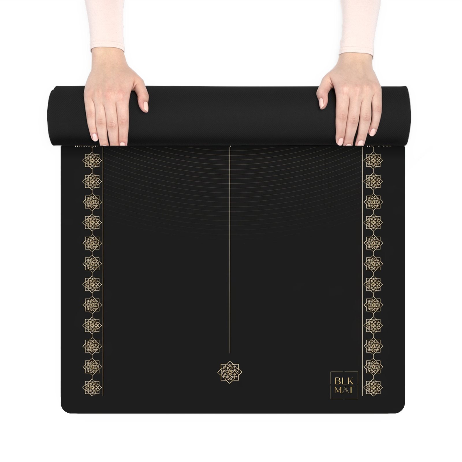 BLKMAT Fana Horizon yoga mat, held up and partly rolled