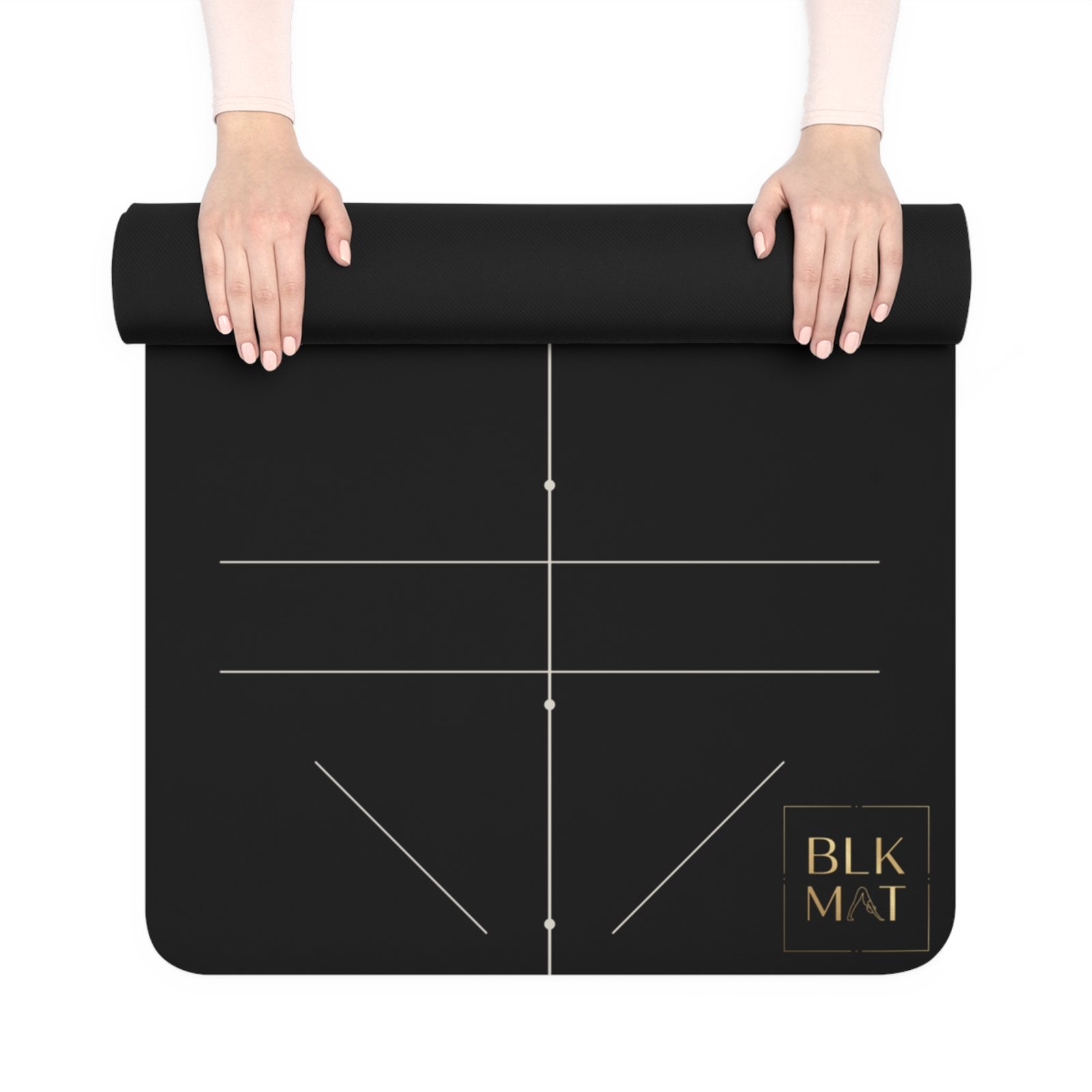BLKMAT Fine-Line Alignment yoga mat, held up and partly rolled