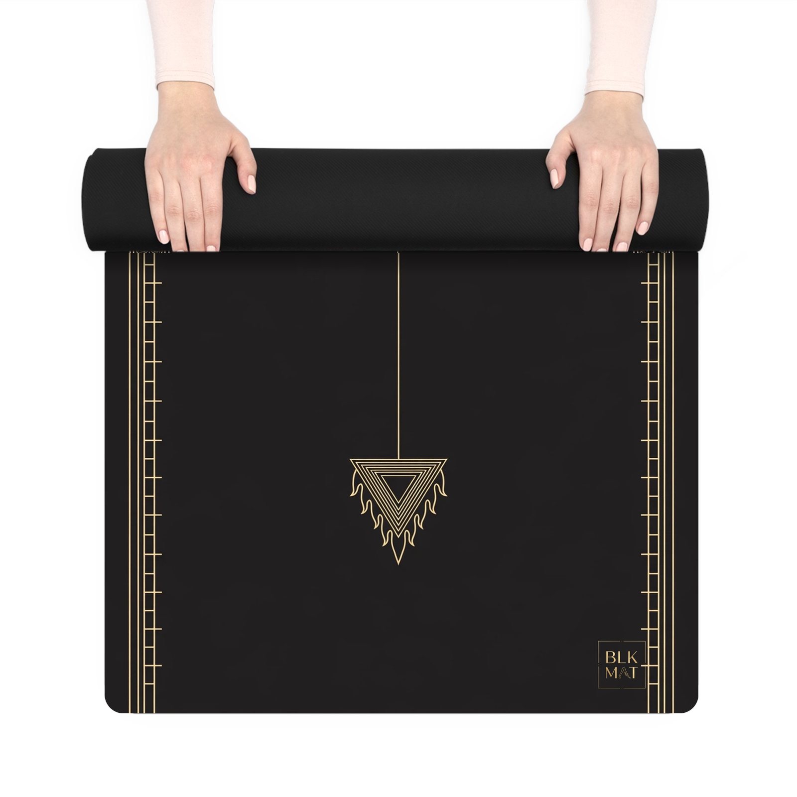 BLKMAT Fire Altar yoga mat, held up and partly rolled