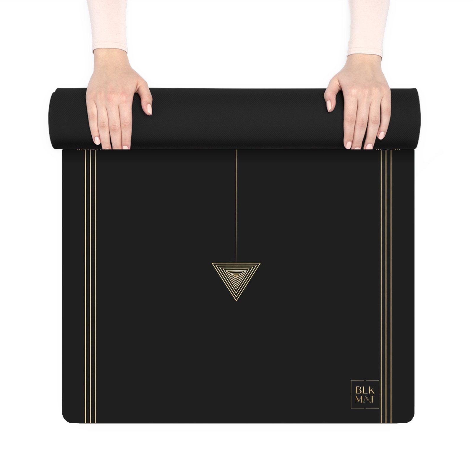 BLKMAT Kosha Orbit yoga mat, held up and partly rolled