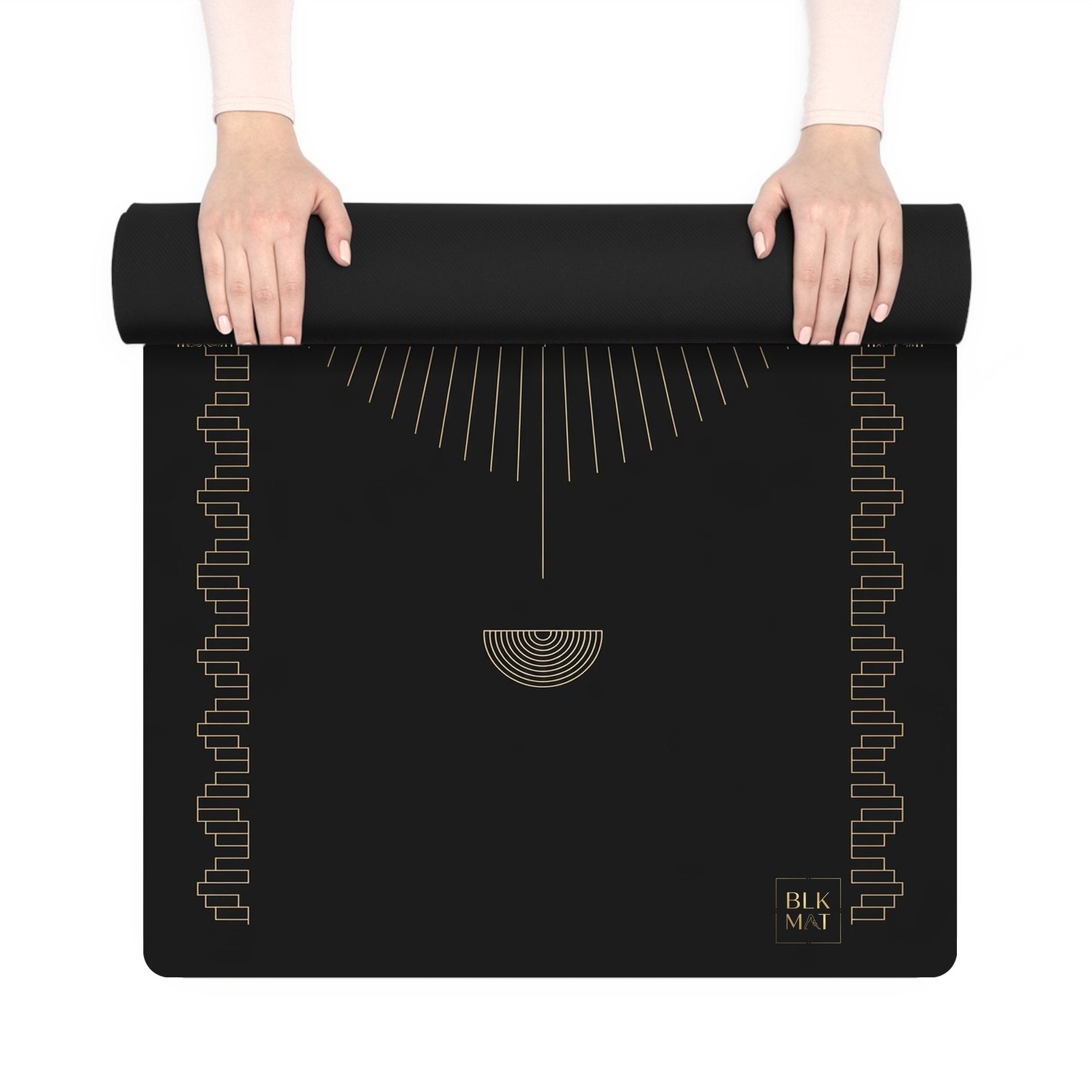 BLKMAT Mission Arch yoga mat, held up and partly rolled