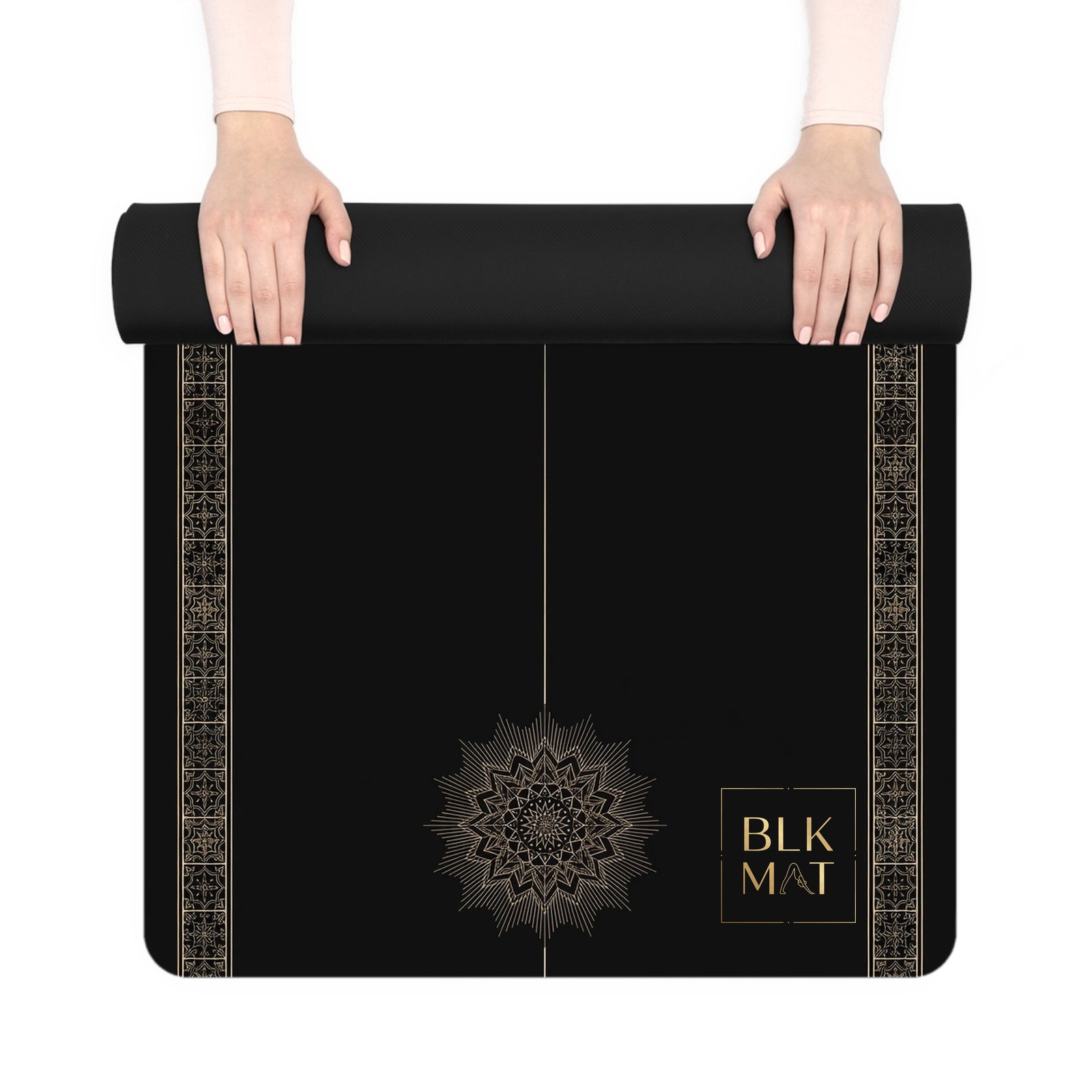 BLKMAT Mission Tile yoga mat, held up and partly rolled