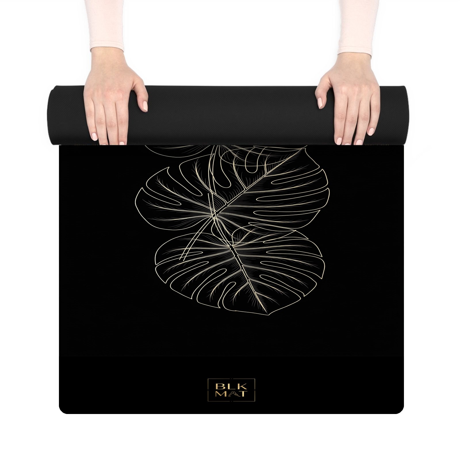 BLKMAT Monstera Leaf Veins yoga mat, held up and partly rolled