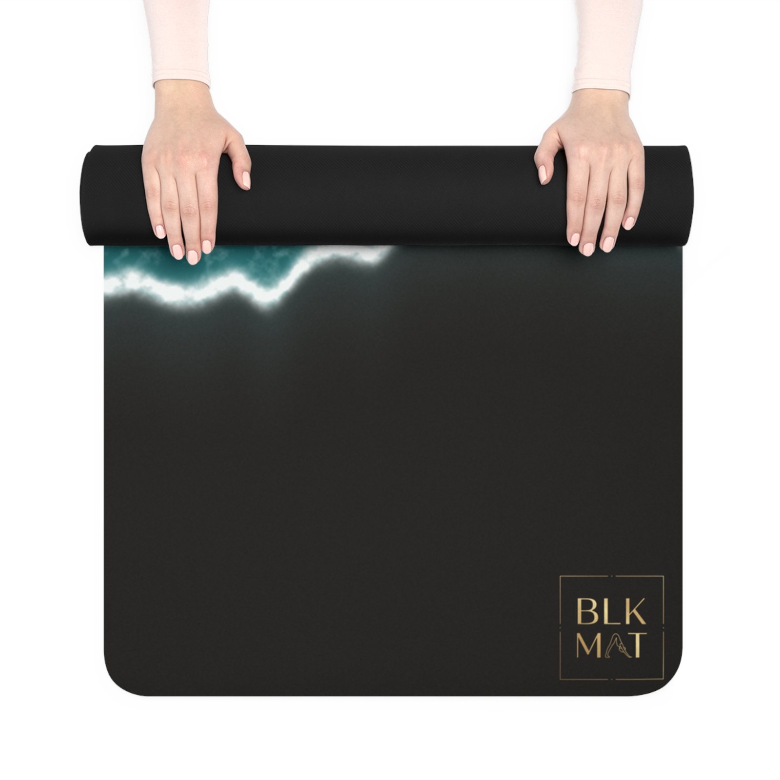 BLKMAT Ocean Tide yoga mat, held up and partly rolled