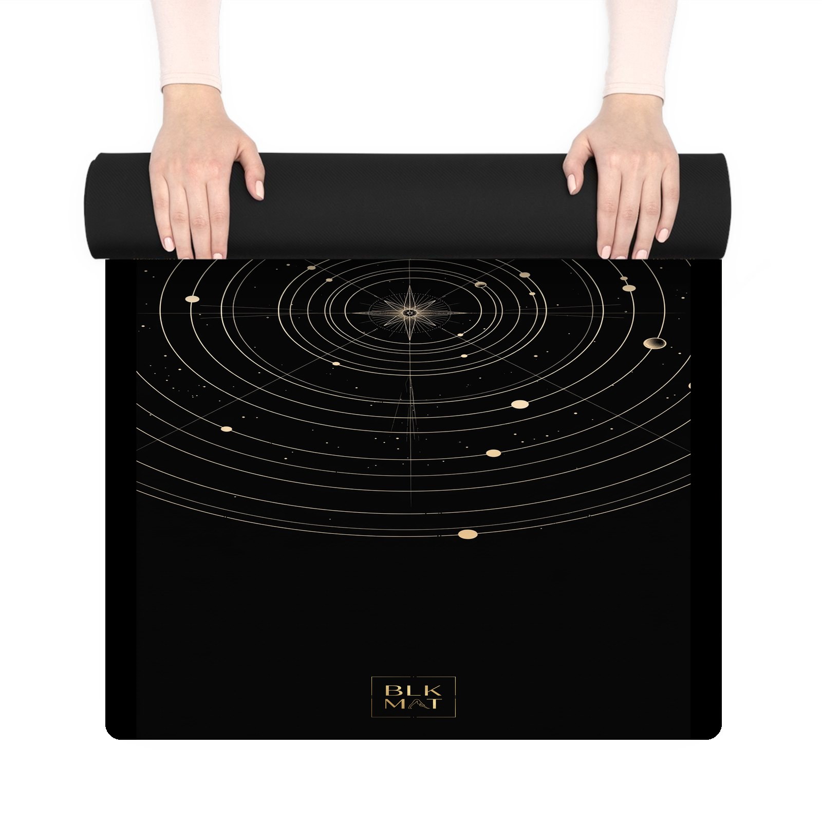 BLKMAT Orbit Chart yoga mat, held up and partly rolled