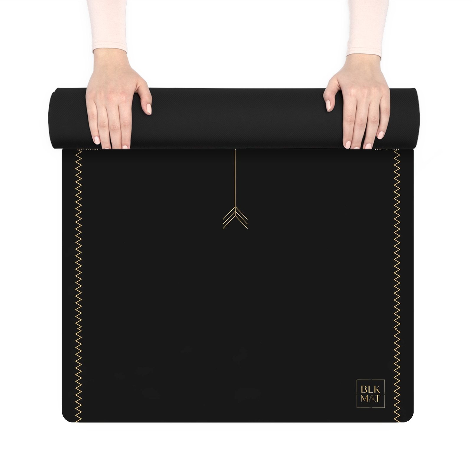 BLKMAT Padres Ridge yoga mat, held up and partly rolled