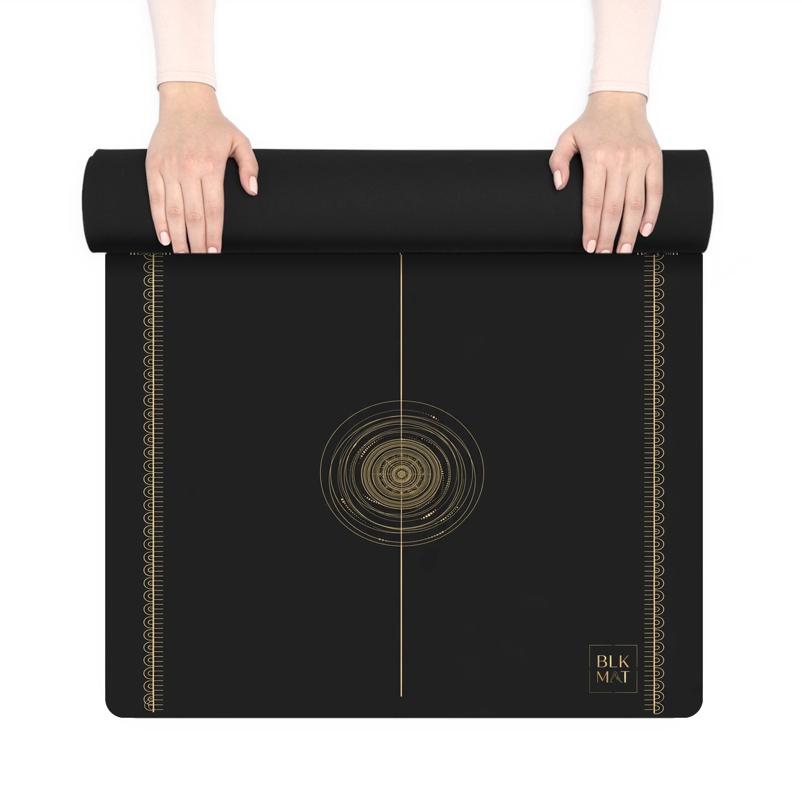 BLKMAT Prayer Band yoga mat, held up and partly rolled