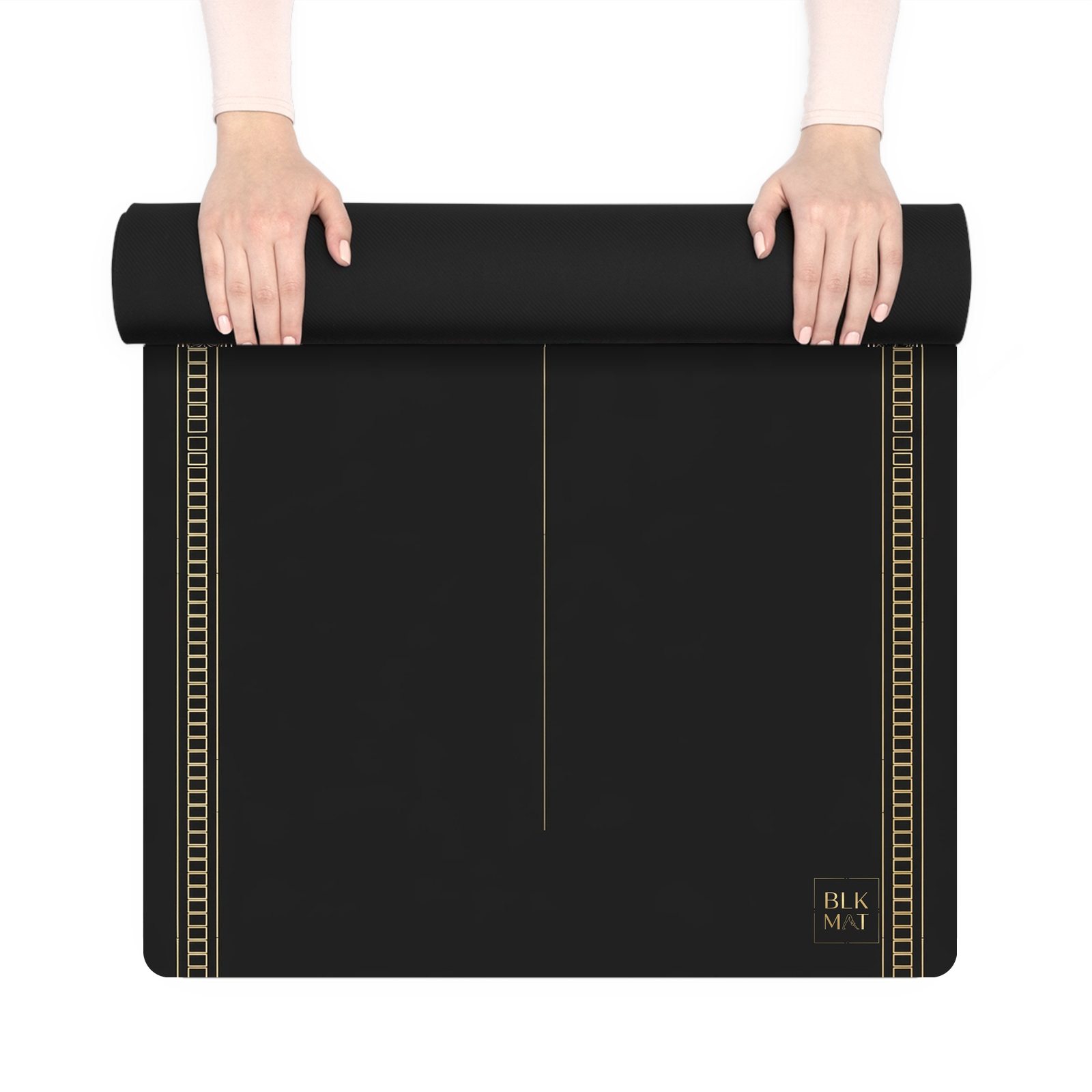 BLKMAT Silent Reed yoga mat, held up and partly rolled