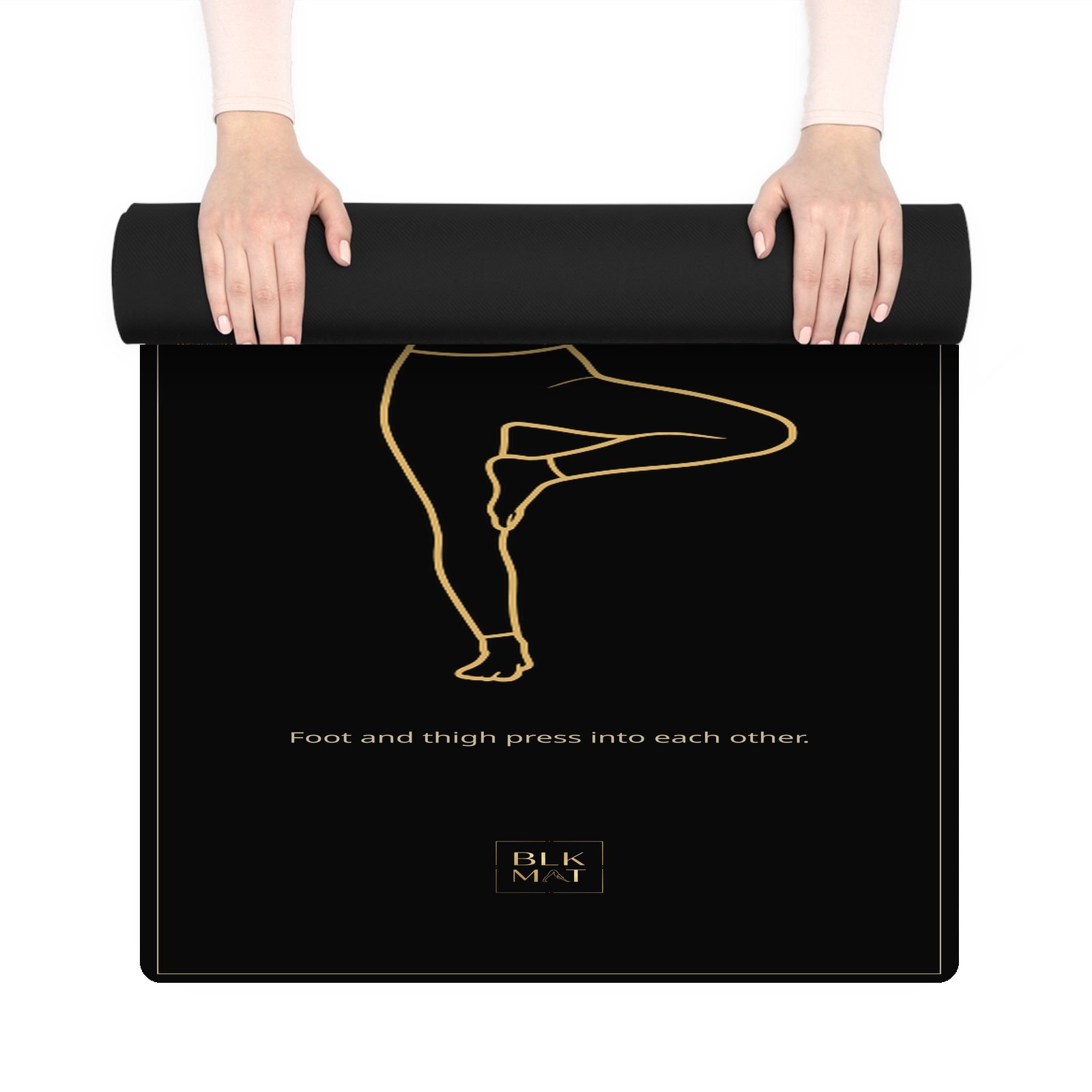 BLKMAT Tree Pose yoga mat, held up and partly rolled