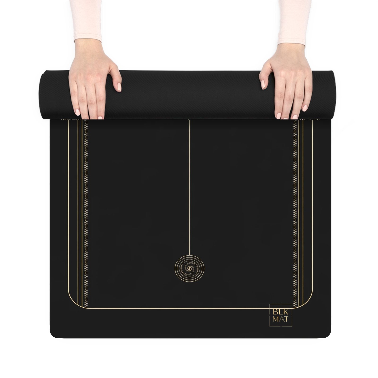 BLKMAT Turning Axis yoga mat, held up and partly rolled