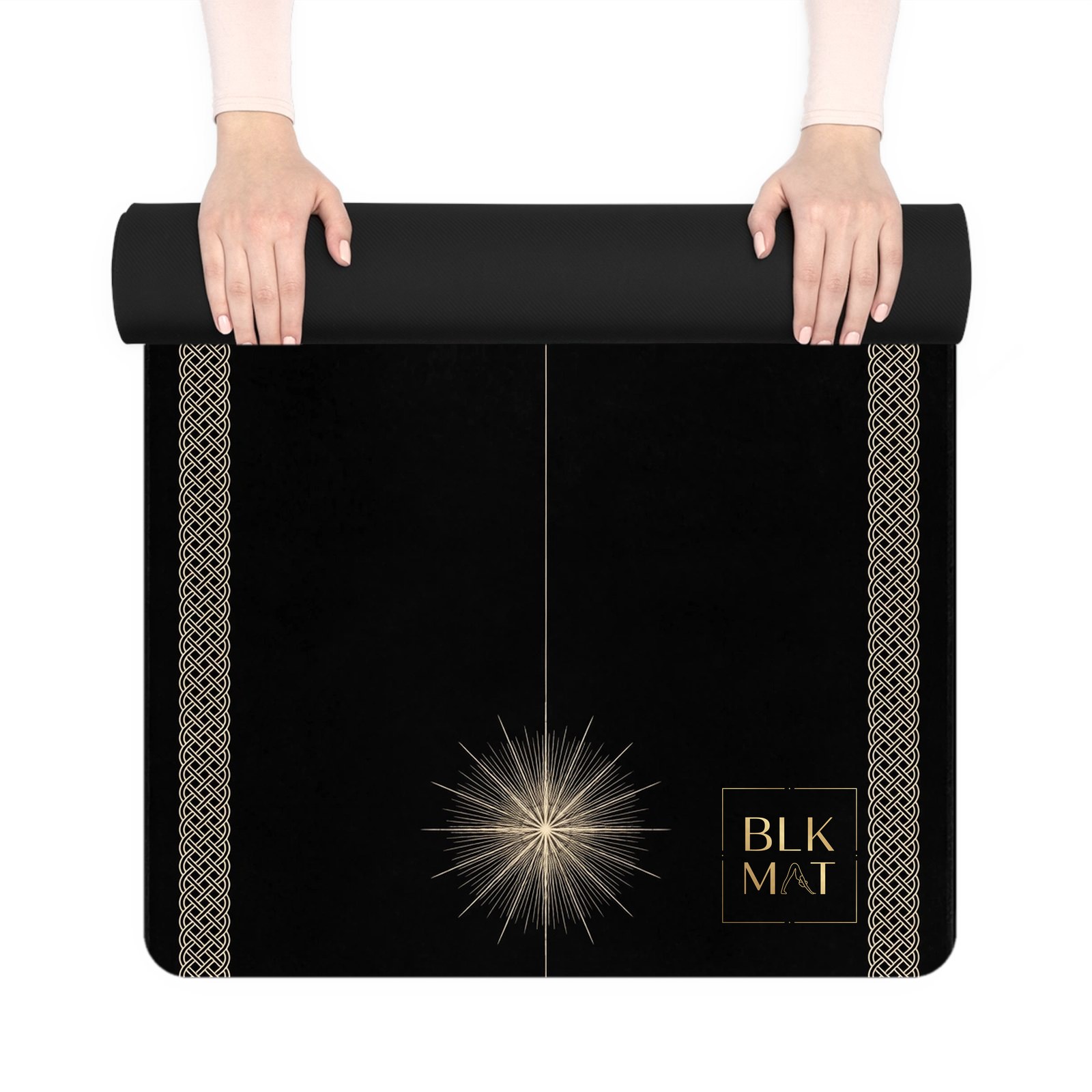 BLKMAT Vajra Lotus yoga mat, held up and partly rolled