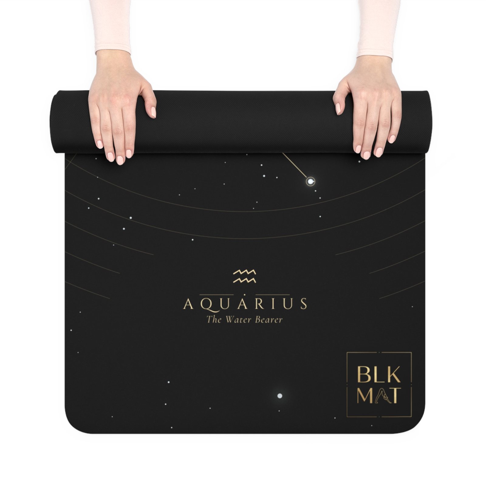 BLKMAT Aquarius Constellation yoga mat, held up and partly rolled