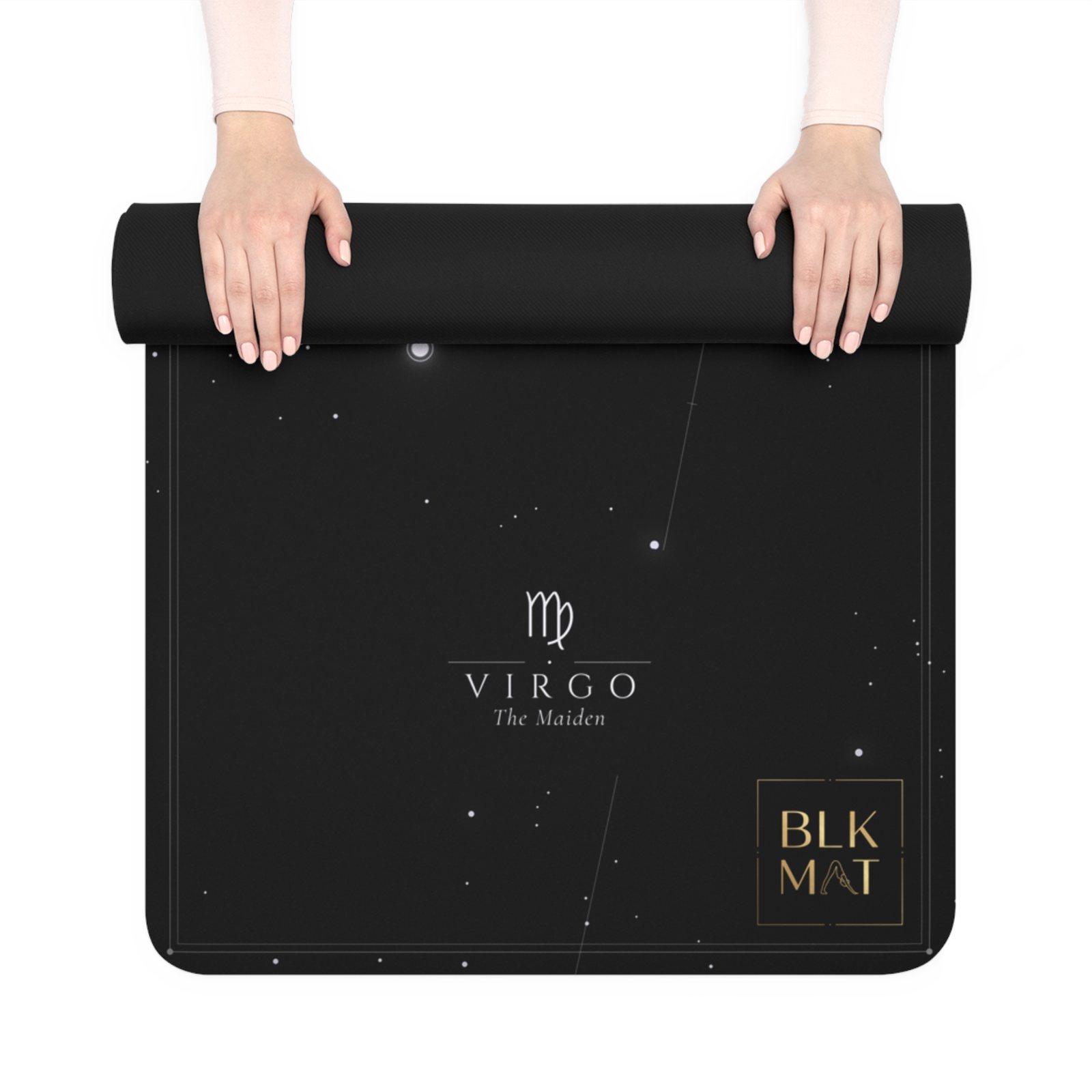 BLKMAT Virgo Constellation yoga mat, held up and partly rolled