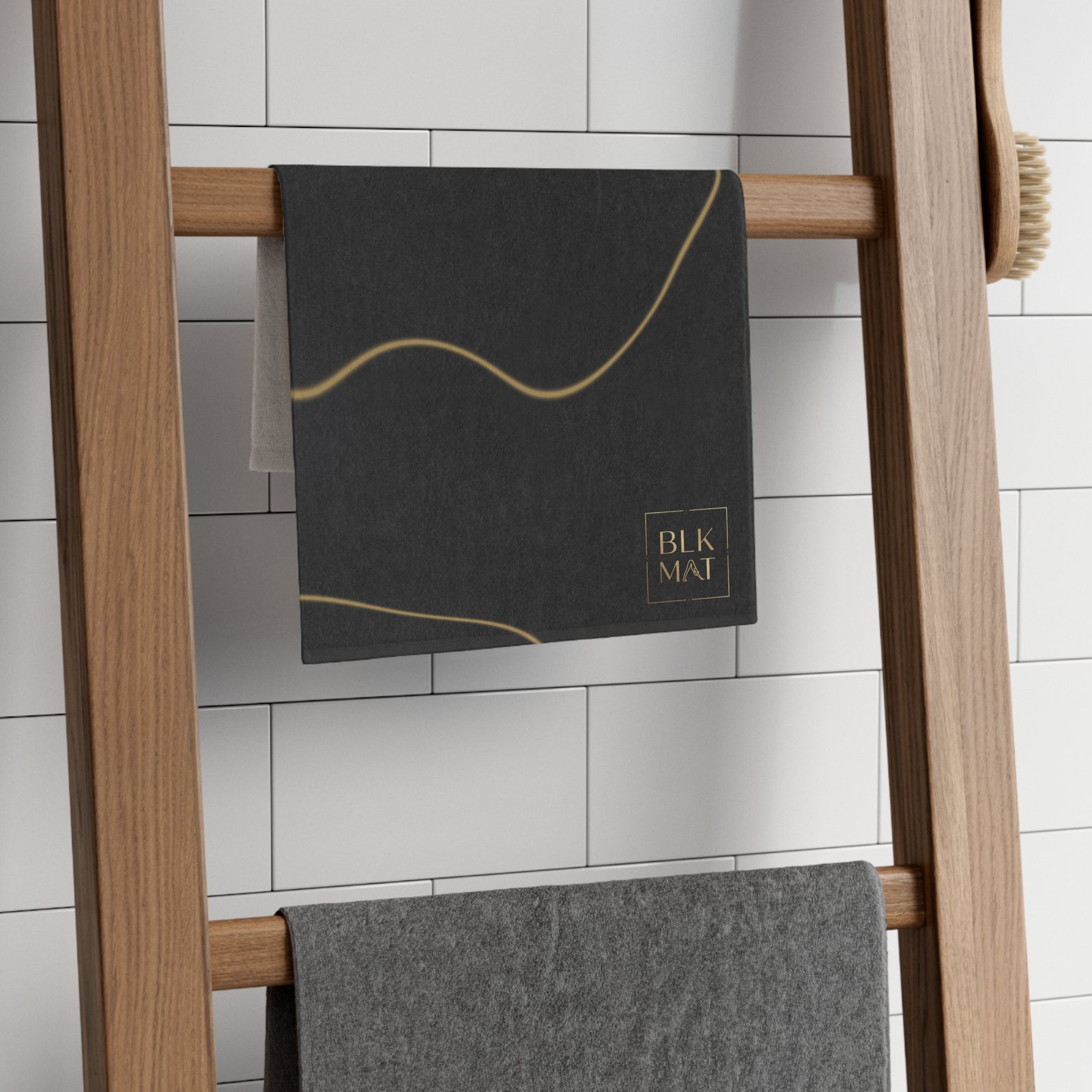 BLKMAT Black Marble, Gold Vein Gym Towel, on a towel ladder
