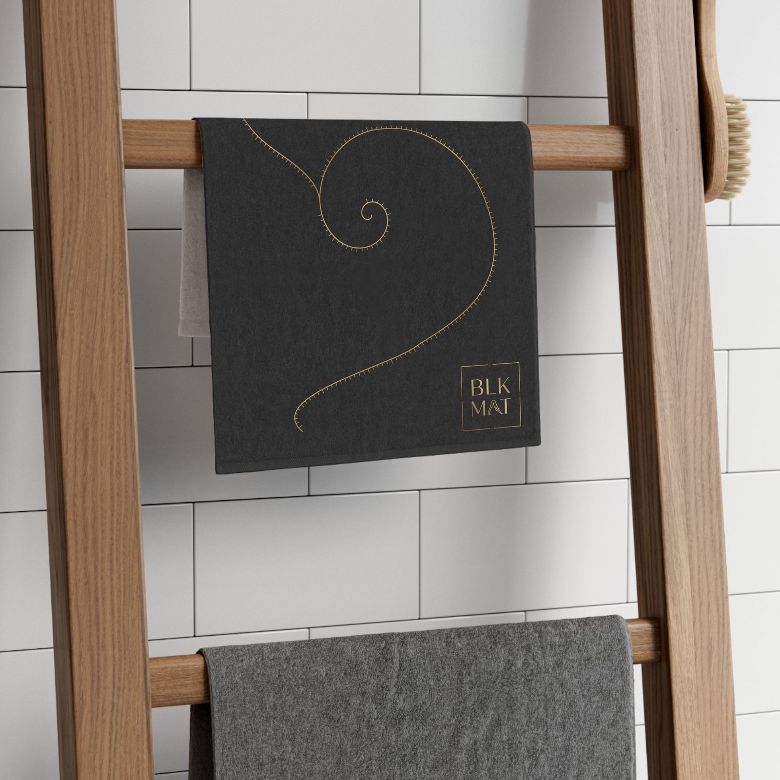 BLKMAT Golden Meridian Gym Towel, on a towel ladder