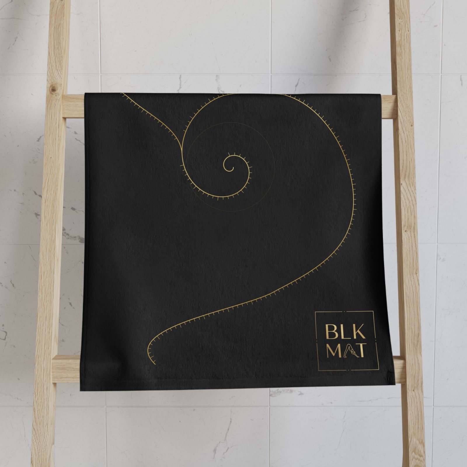 BLKMAT Golden Meridian Hand Towel, on a towel ladder