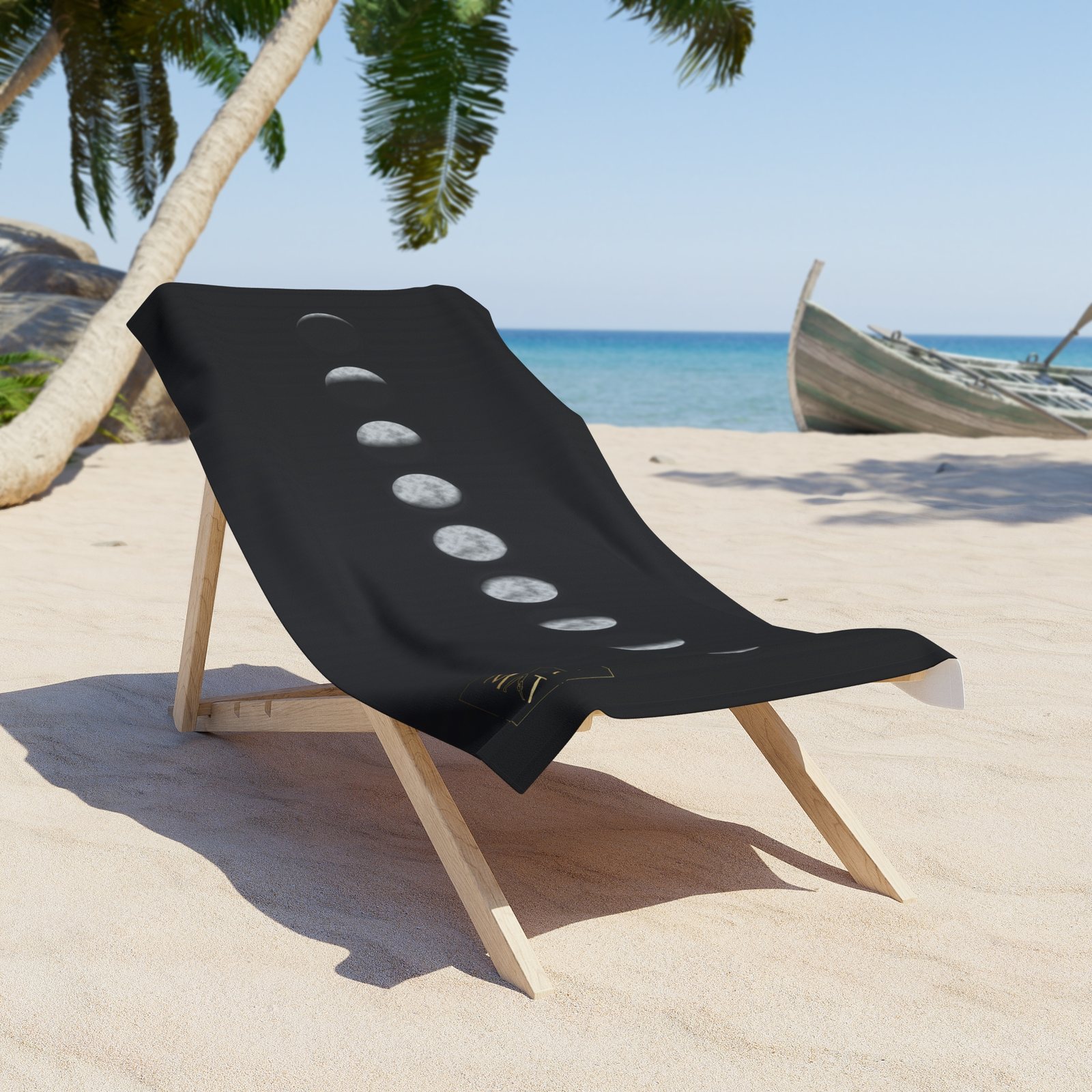 BLKMAT Midnight Moon Phases Beach Towel, on a beach chair