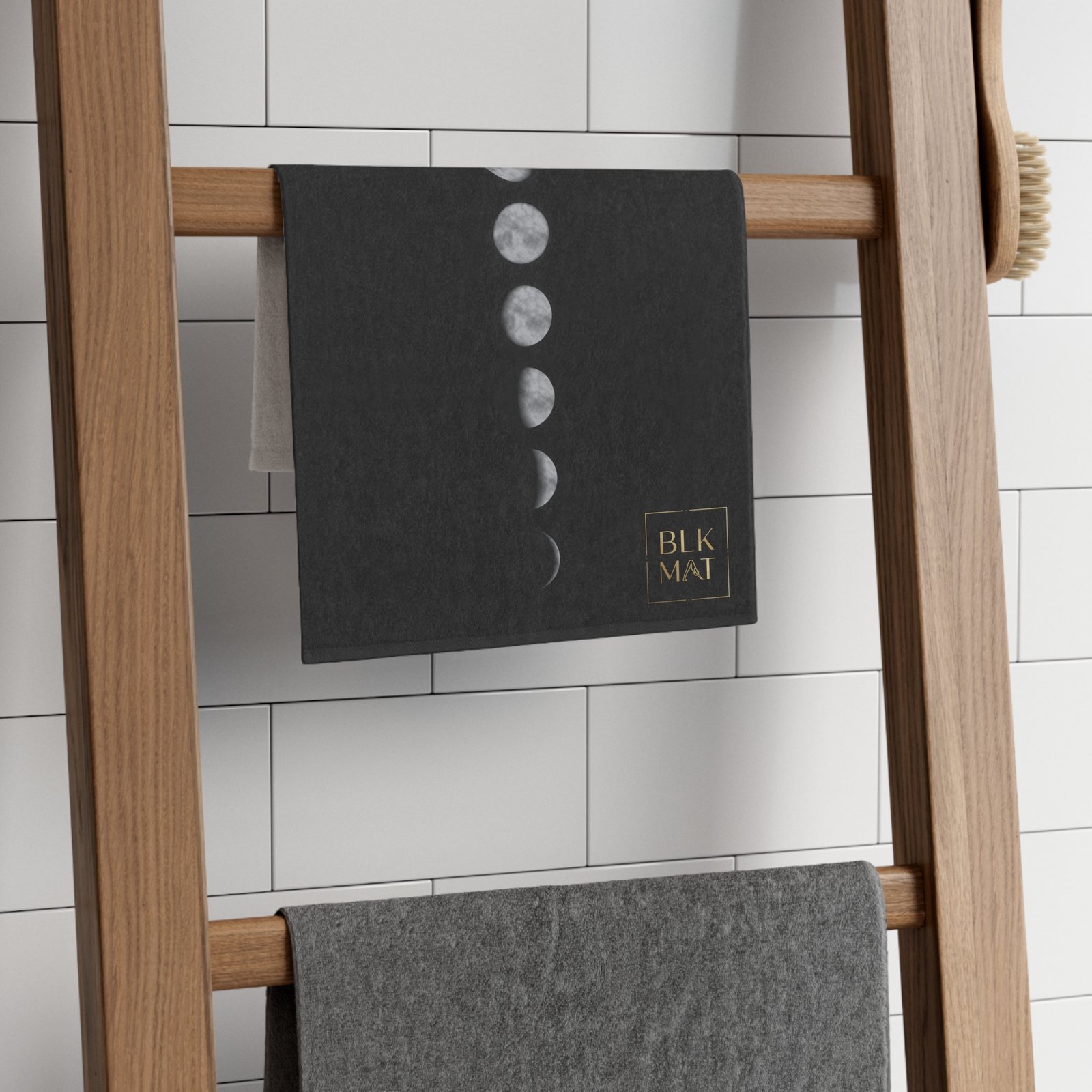 BLKMAT Midnight Moon Phases Gym Towel, on a towel ladder