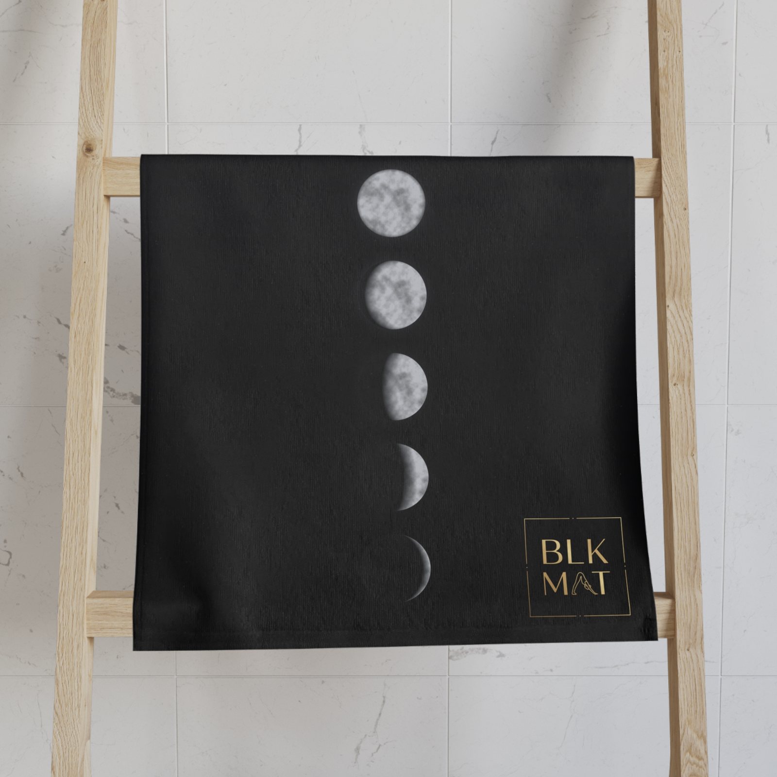 BLKMAT Midnight Moon Phases Hand Towel, on a towel ladder