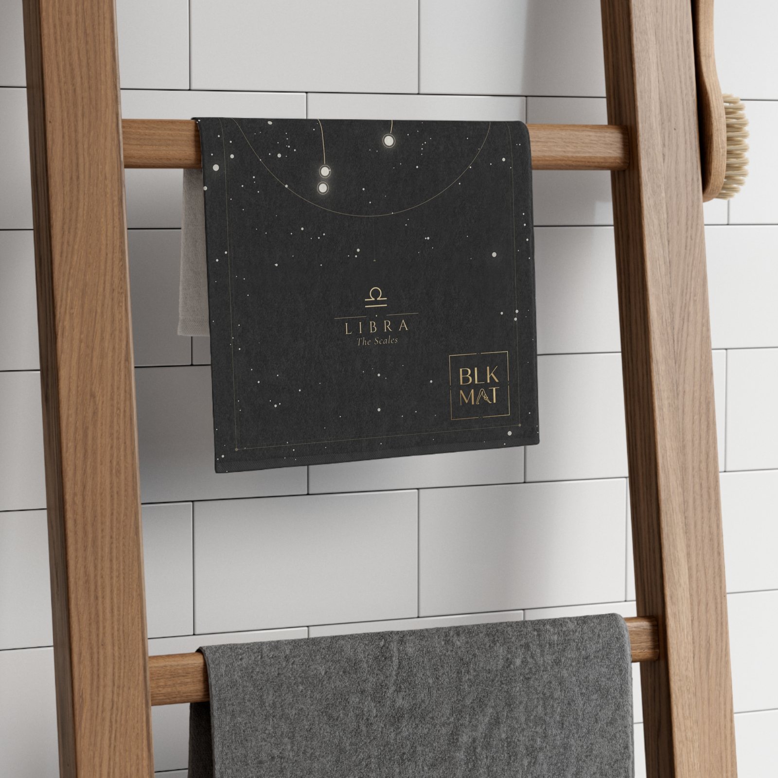 BLKMAT Libra Constellation Gym Towel, on a towel ladder